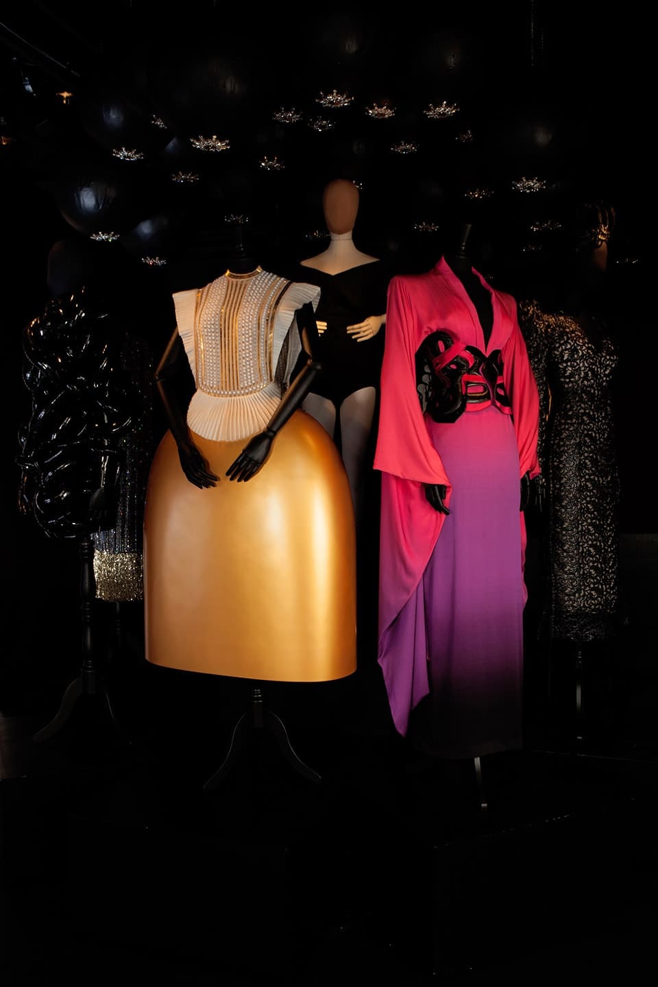 a group of mannequins in a room