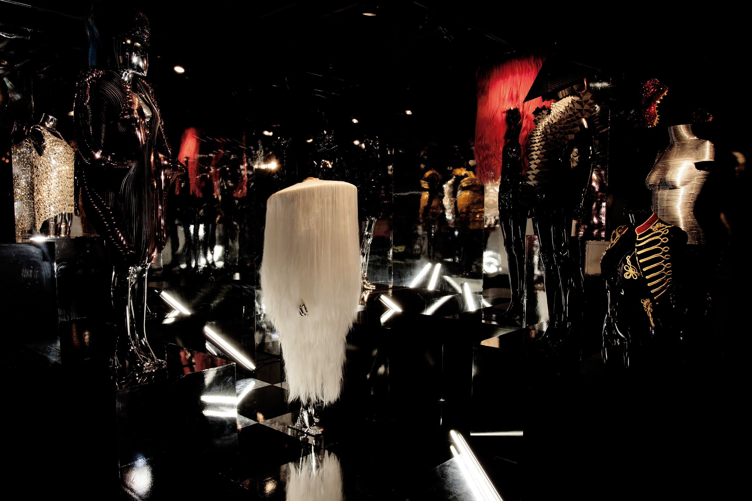 a group of mannequins in a room