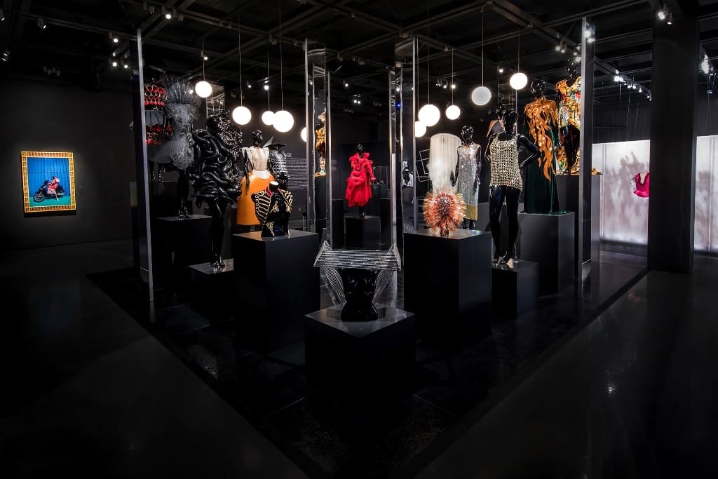 a display of mannequins in a room