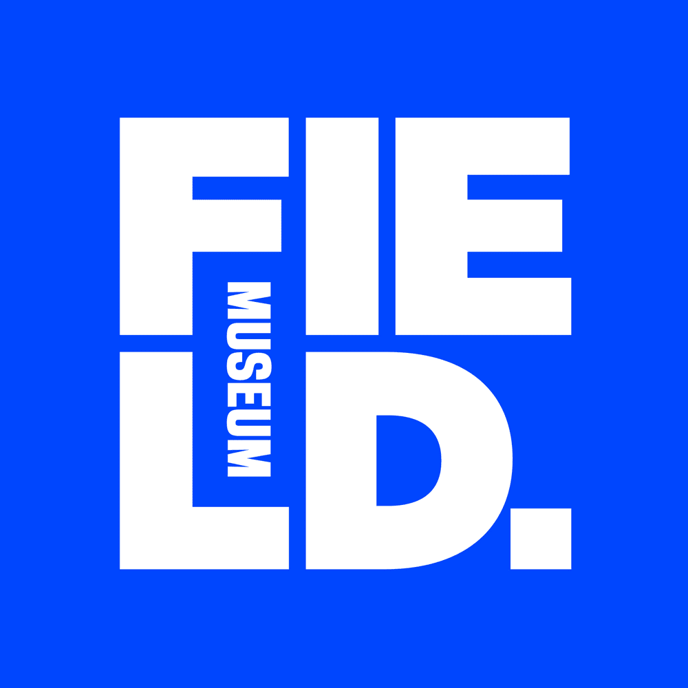 White block letters on a blue background spell "FIELD." with "MUSEUM" vertically inside the "FIE" section—a dynamic design reflecting the creativity of Flying Fish Traveling Exhibitions Who We Are.